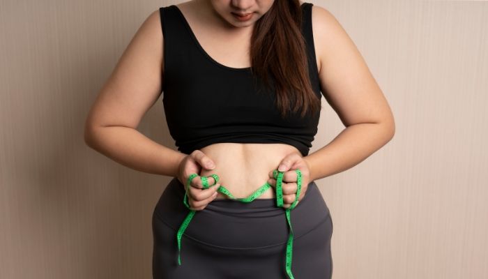 Bloating Vs. Fat: How To Tell The Difference, From Experts